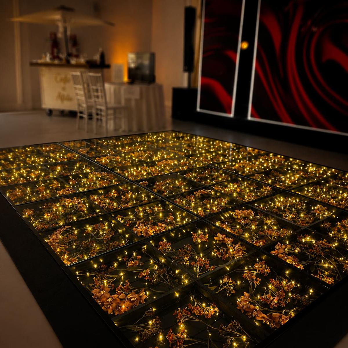 Pista de LED com flores e iluminação dourada
